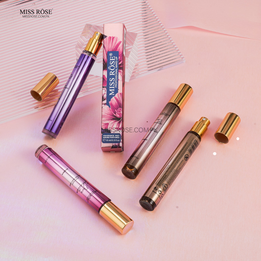 Miss Rose perfume bottles and packaging on a pink background